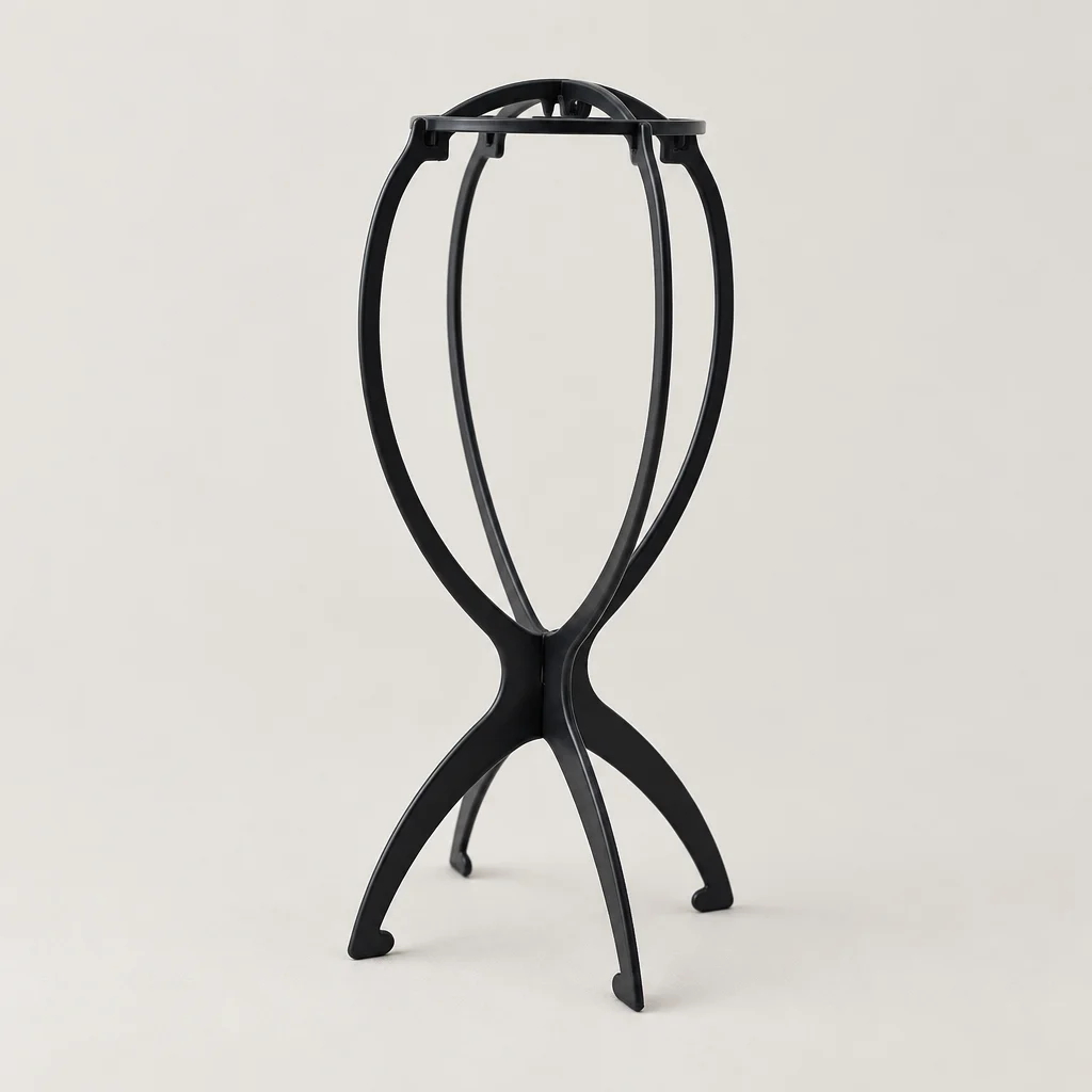 Black foldable wig stand at an angle